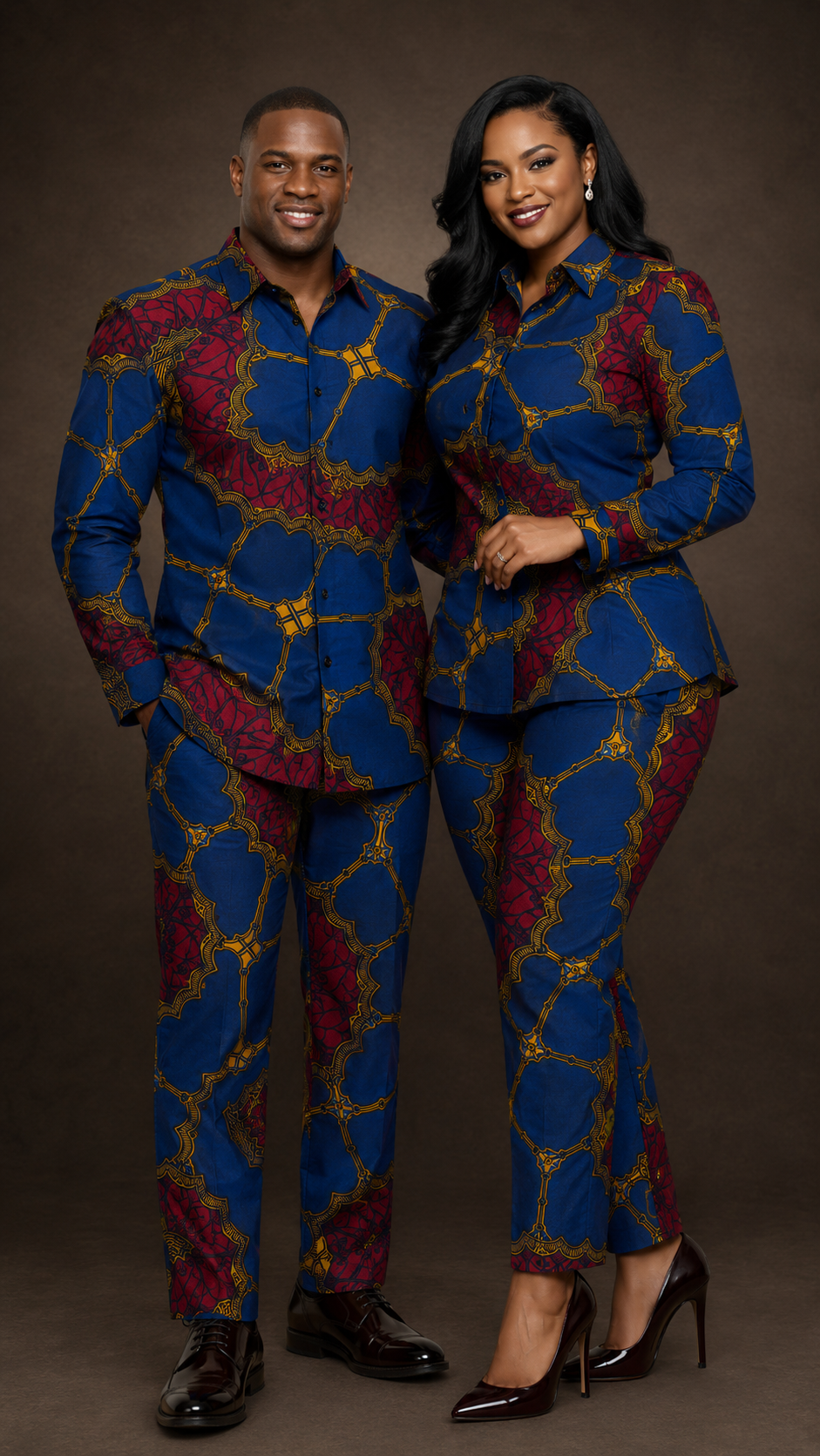 Couple wearing matching royal blue and crimson Ankara co-ord suits made from this fabric