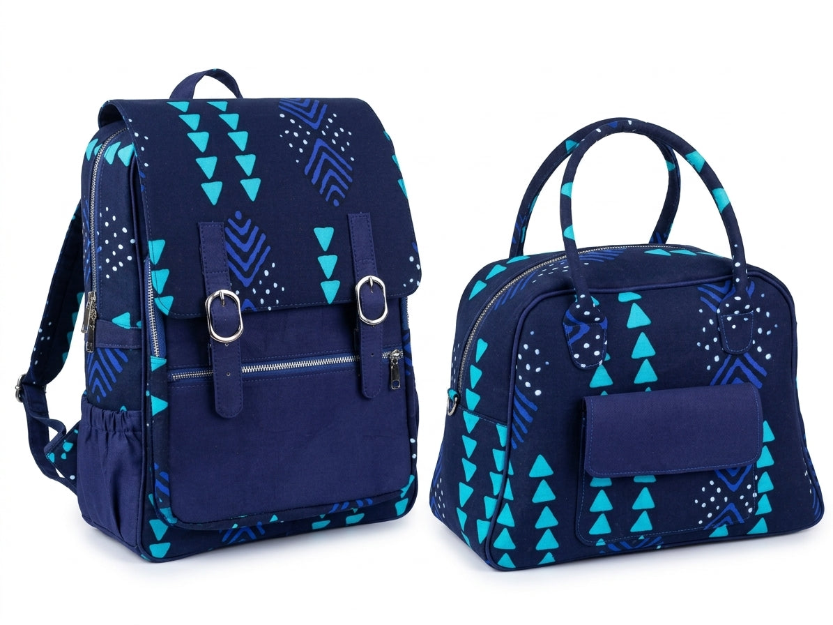 Angled front view of Ankara navy blue teal triangle print backpack and bowling handbag set showing full print coverage and silver hardware