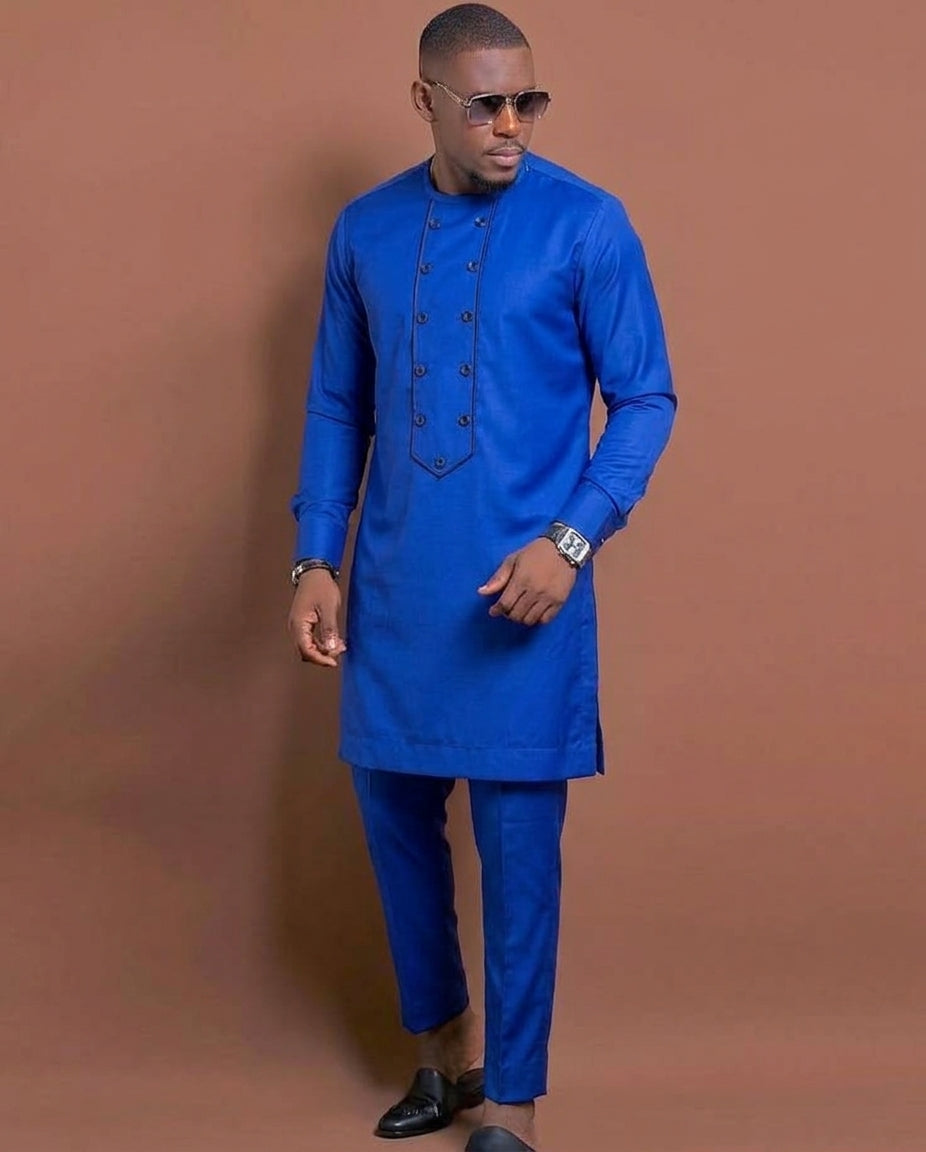 Full length front view of men's royal blue senator suit with double button bib detail, full-length sleeves and matching slim-leg trousers