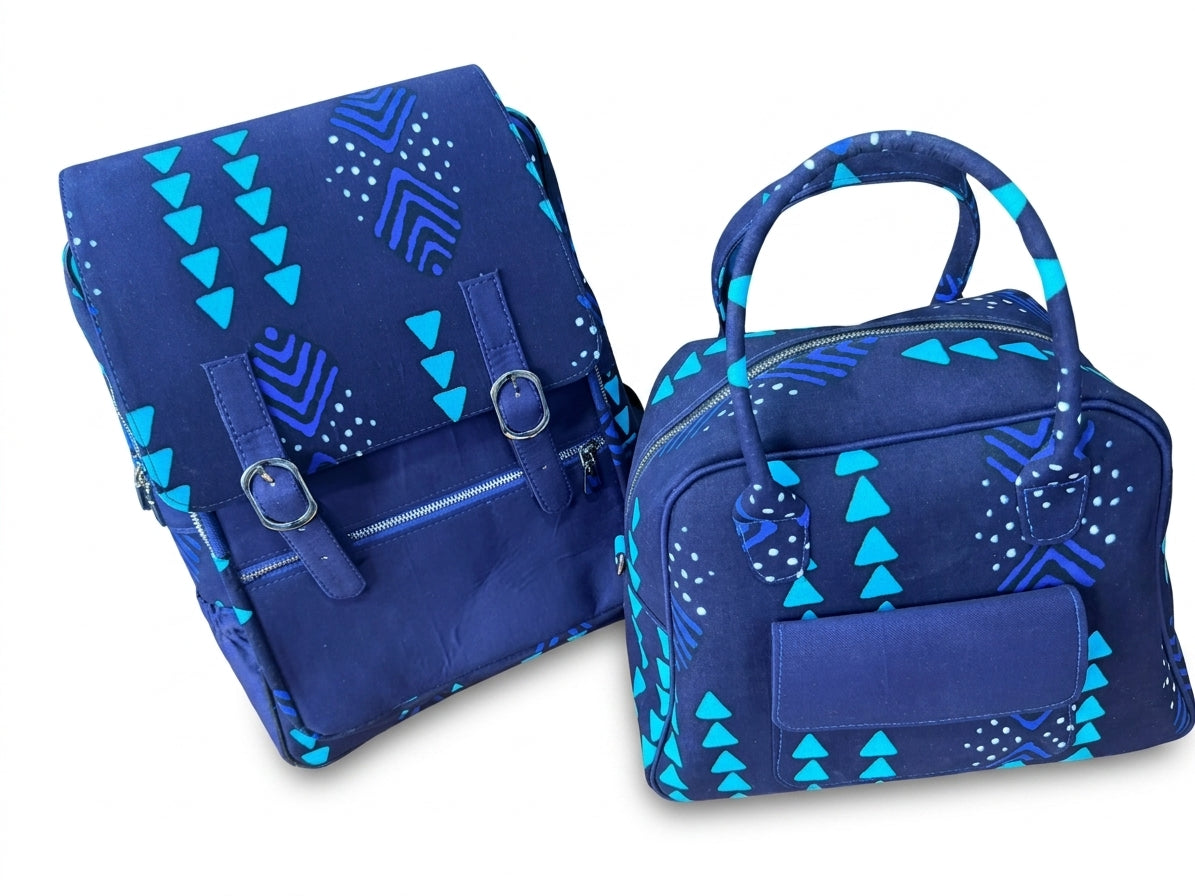 Ankara print backpack and bowling handbag set in navy blue with teal triangle and chevron print, front view showing both bags together