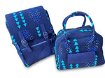 Ankara print backpack and bowling handbag set in navy blue with teal triangle and chevron print, front view showing both bags together