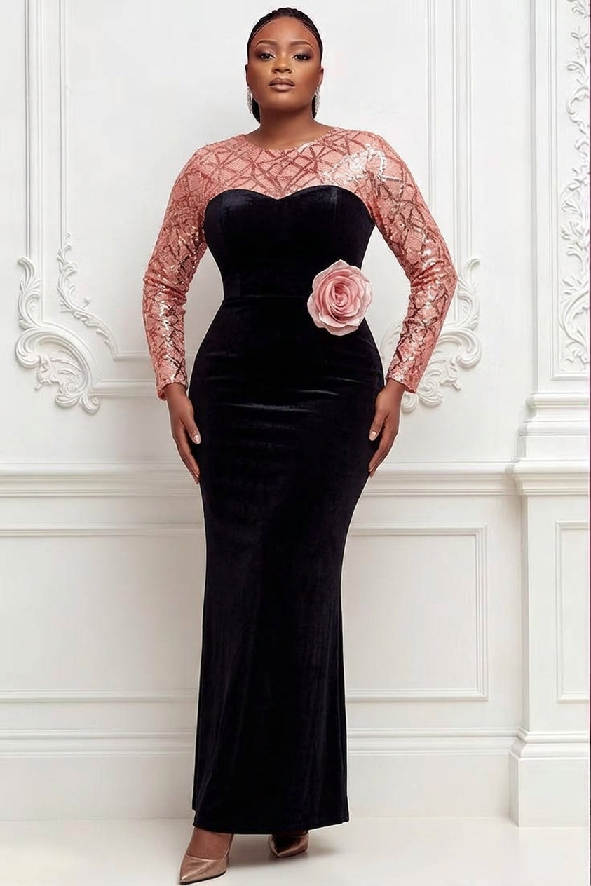 Woman wearing black velvet mermaid gown with rose gold sequin bodice and blush pink 3D rose corsage detail at waist, front view with corsage styling option