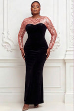 Woman wearing black velvet mermaid gown with rose gold sequin geometric lattice bodice, sheer long sequin sleeves and sweetheart neckline cutout, front view without corsage