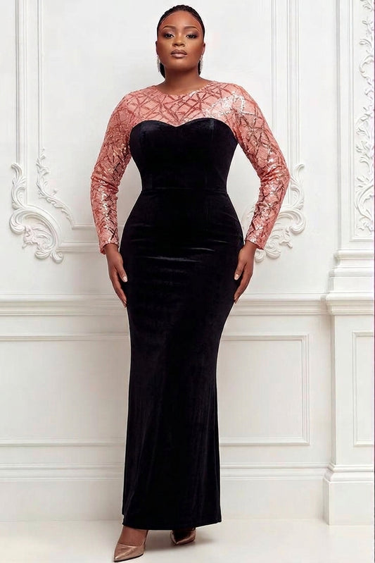 Woman wearing black velvet mermaid gown with rose gold sequin geometric lattice bodice, sheer long sequin sleeves and sweetheart neckline cutout, front view without corsage