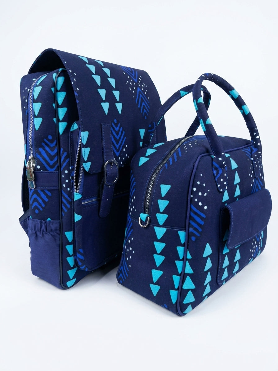 Side view of Ankara navy blue teal triangle print backpack and handbag set showing padded straps, side zip pockets and structured silhouette