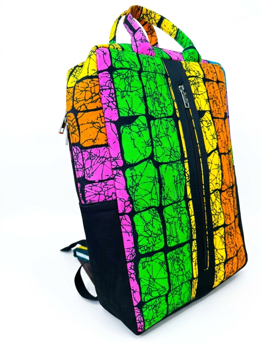 Side view of Ankara print backpack in multicolour mosaic crackle pattern with dual zip compartments and top carry handles