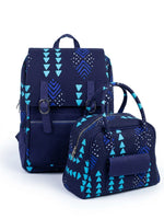 Front view of Ankara navy blue teal triangle print backpack and handbag set showing dual silver buckle closure and zip pockets