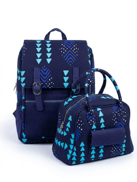 Front view of Ankara navy blue teal triangle print backpack and handbag set showing dual silver buckle closure and zip pockets