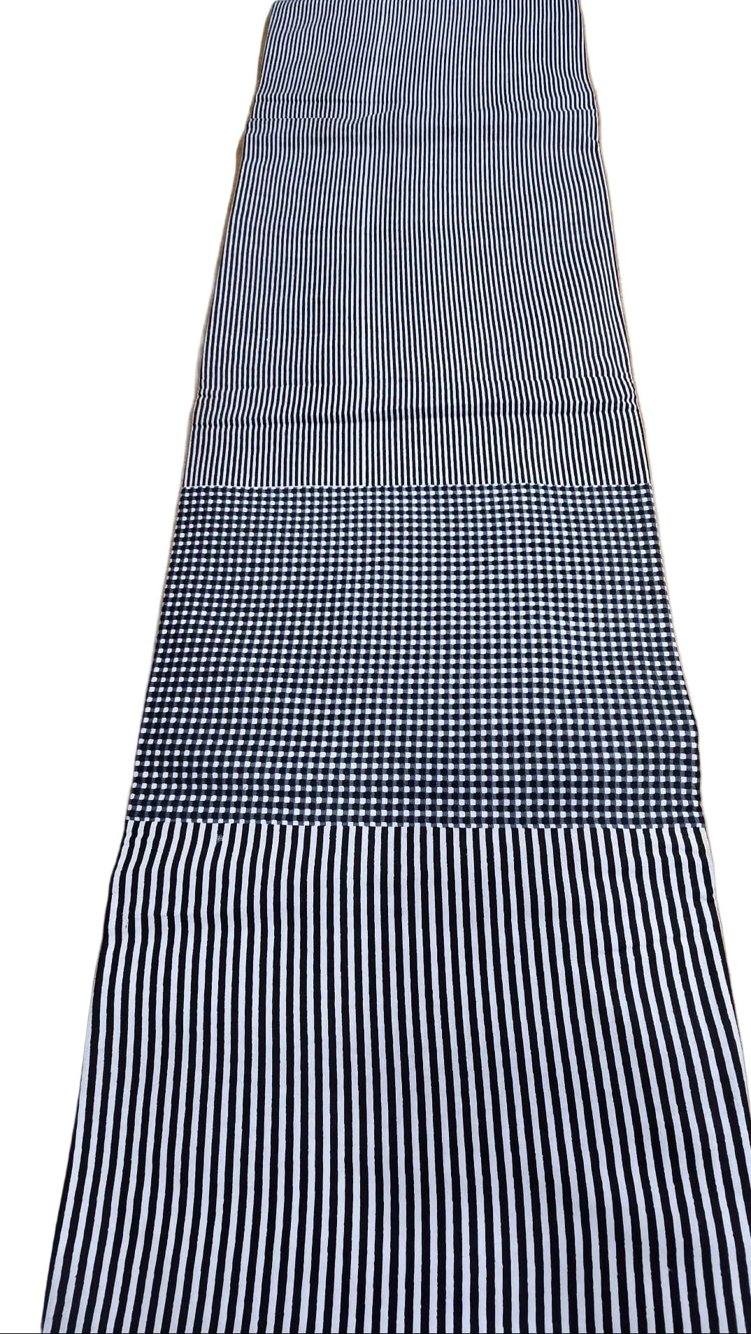 Long black and white striped fabric swatch on a white background