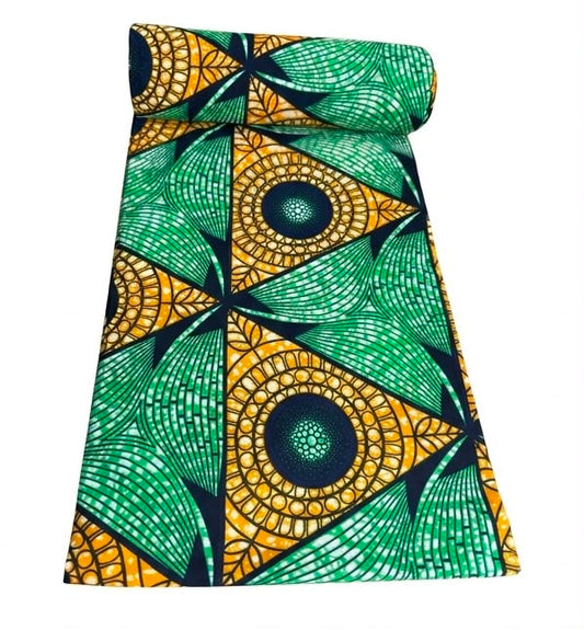 Green and gold geometric fan Ankara wax print fabric unrolled showing full pattern detail