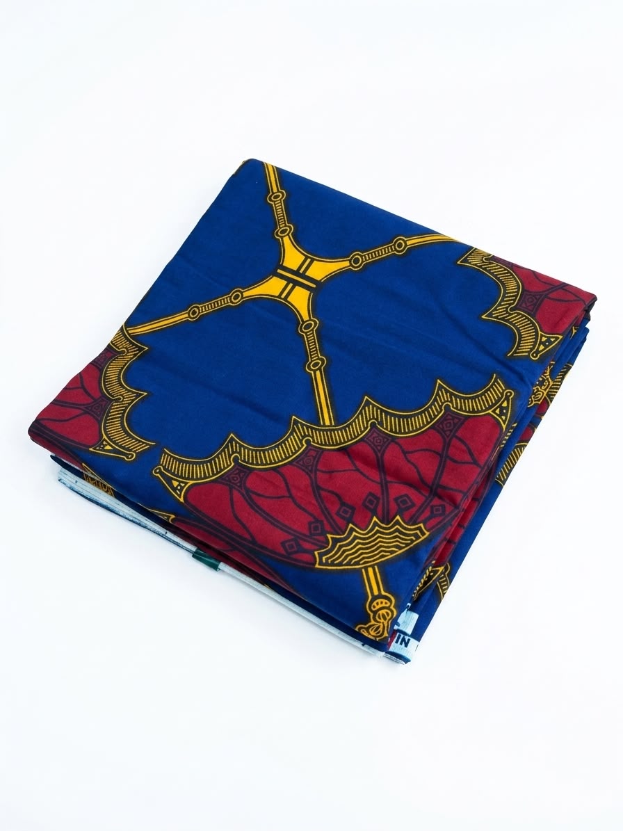 Royal blue and crimson medallion chain Ankara wax print cotton fabric, folded neatly