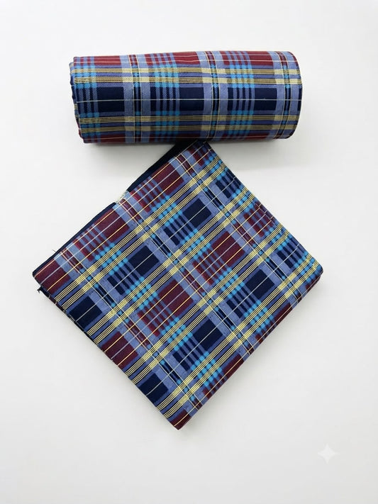 Navy blue tartan check African print cotton fabric rolled and folded on white background