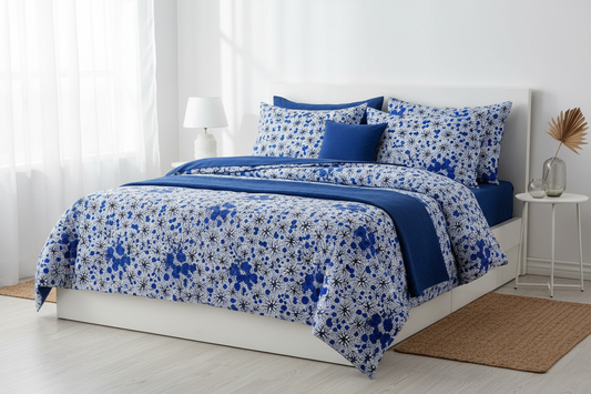 Luxury duvet and bedding set made from white and blue polycotton Ankara fabric