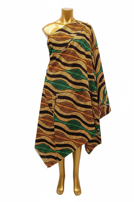 Brown, green and orange Ankara wax print fabric draped on a gold mannequin