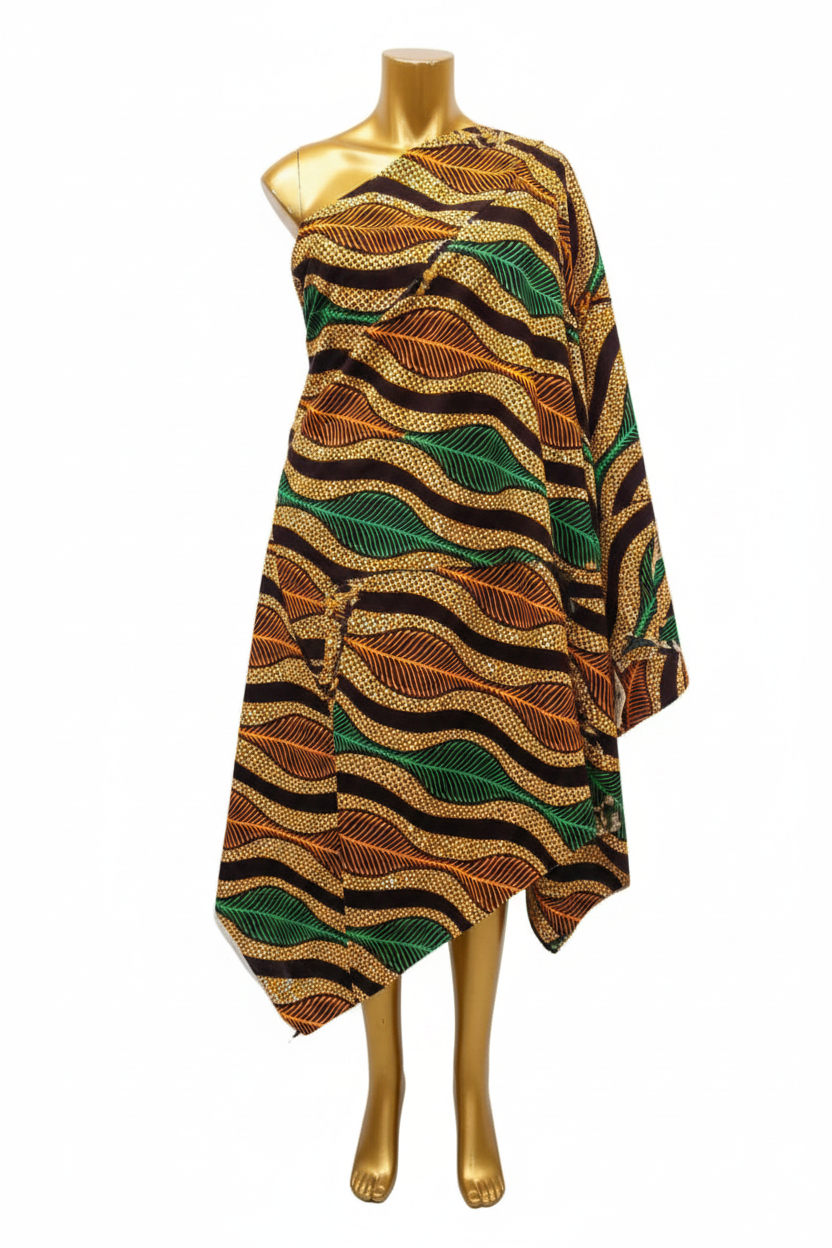 Brown, green and orange Ankara wax print fabric draped on a gold mannequin