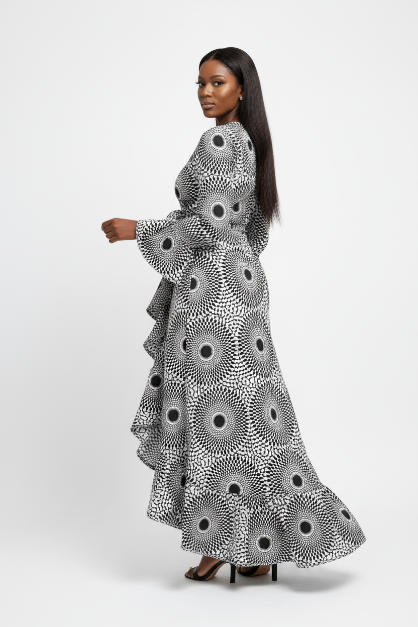 Black and white Ankara Kitenge wrap dress with frills – back turn pose