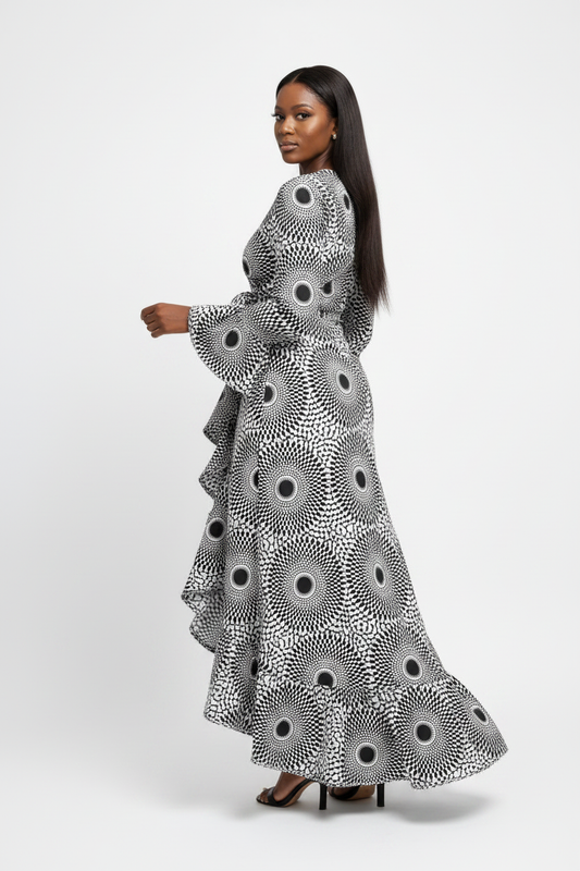 Black and white Ankara Kitenge wrap dress with frills – back turn pose