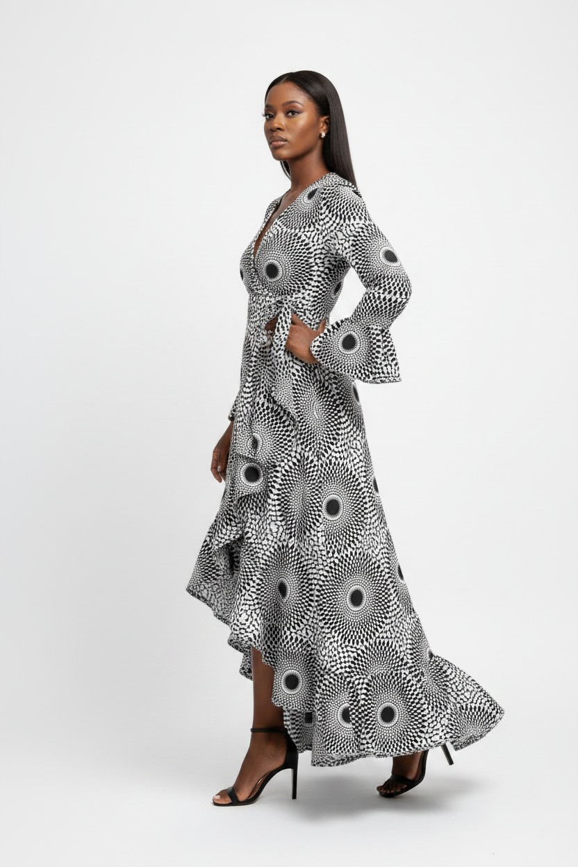 Black and white Ankara Kitenge wrap dress with frills – side walking pose