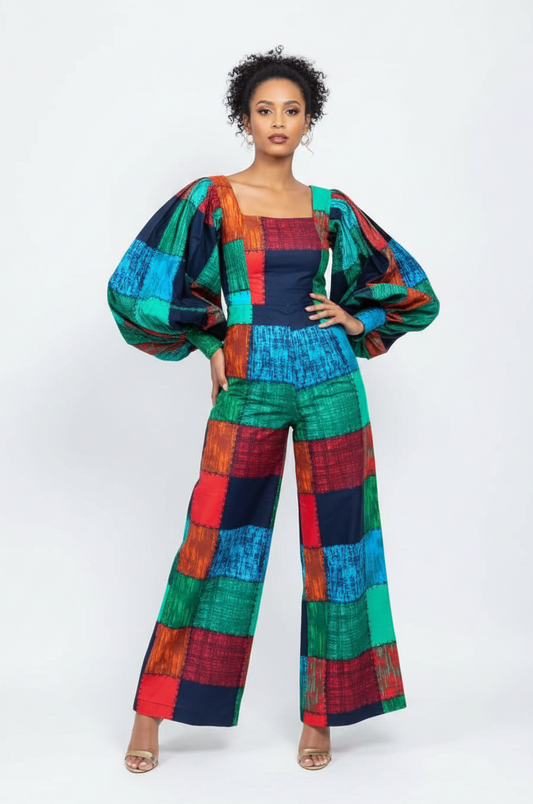 Jumpsuit in green/red/navy Ankara patchwork fabric