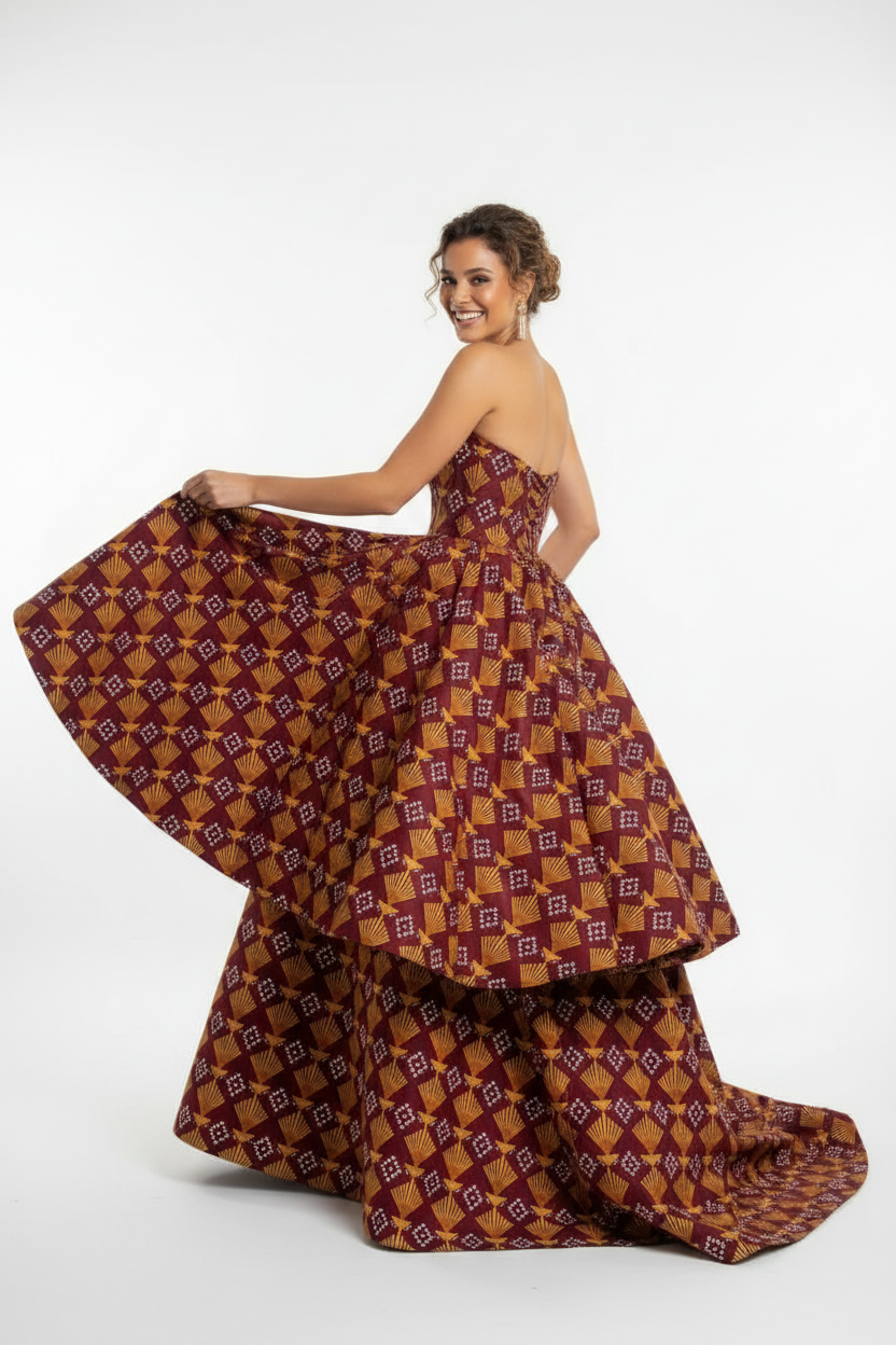 White mixed race model in Ankara prom ballgown, skirt spread wide pose