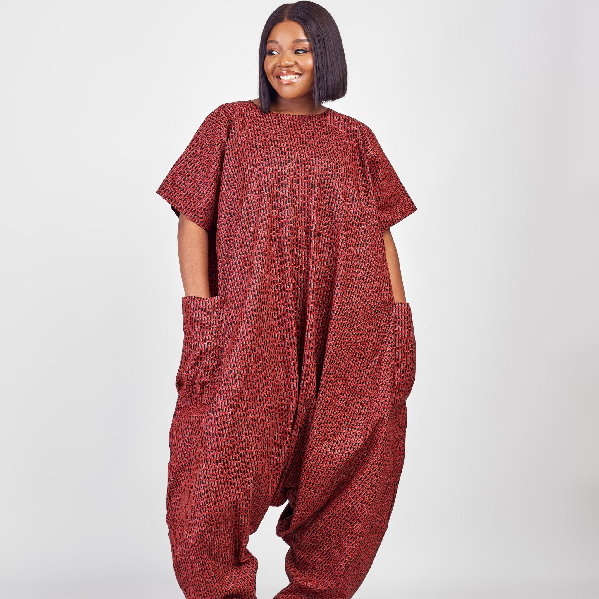 https://houseofprints.uk/cdn/shop/products/african-print-maxi-jumpsuit-available-in-2-colours-206410.jpg?v=1684694747